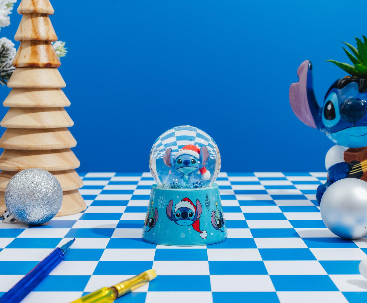 Disney Lilo & Stitch Santa Stitch 3-Inch Mini Light-Up Snow Globe
