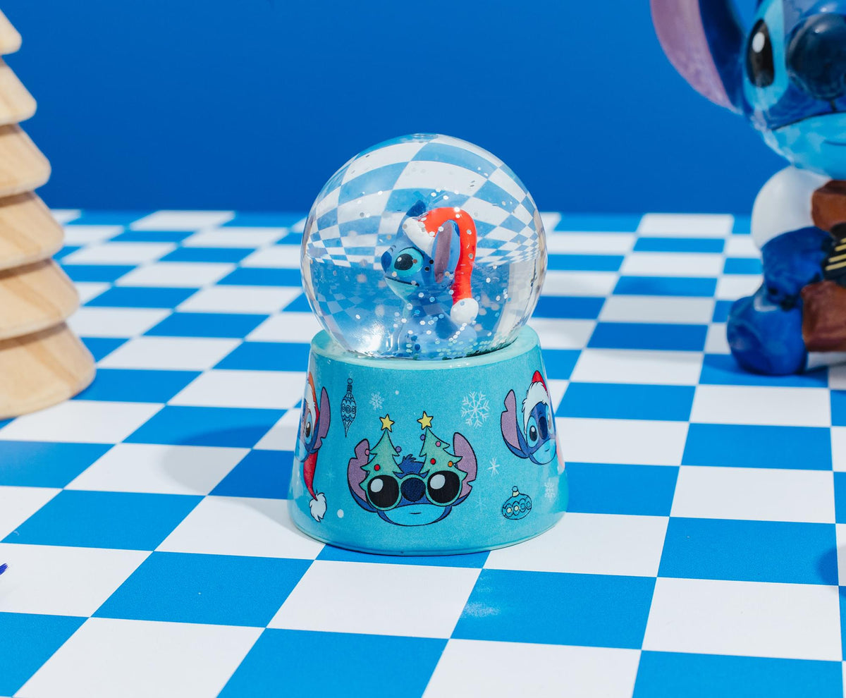 Disney Lilo & Stitch Santa Stitch 3-Inch Mini Light-Up Snow Globe