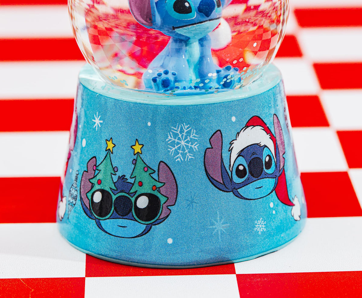 Disney Lilo & Stitch Santa Stitch 3-Inch Mini Light-Up Snow Globe